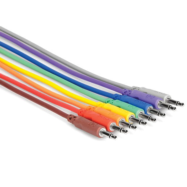 Hosa CMM-830 unbalanced patch cables, 3.5 mm TS connectors, 0.3m length, set of 8 cables on a white background.